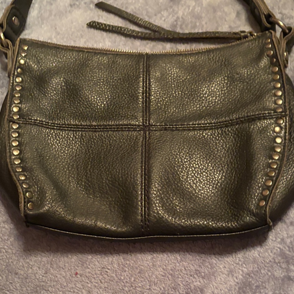 Beautiful Pebbled Leather “The Sak” purse with antique gold studs and hardware.